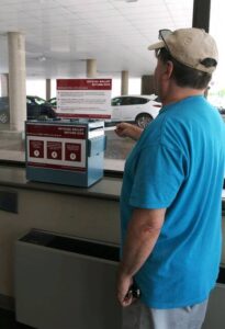A Wilkes-Barre man deposits his primary election mail ballot in the drop box at the Luzerne County-owned Penn Place building in the city’s downtown this past May.
                                 Times Leader file photo