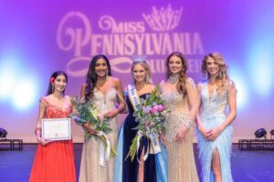 Miss Pennsylvania Volunteer Top 5, including Miss Pennsylvania Volunteer 2023 Abby Traxler (center); Miss Greater Hazleton Julia Snyder (4th from left); and Miss Keystone Mackenzie Sherman (5th from left)/
                                 Photo courtesy of Eireann Photography