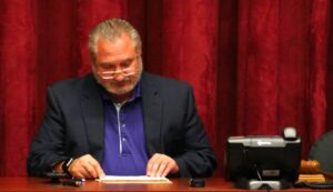 Luzerne County Ethics Commission Chairman Thomas Mosca reviews paperwork during Monday’s meeting at the county courthouse in Wilkes-Barre.
                                 Jennifer Learn-Andes|Times Leader