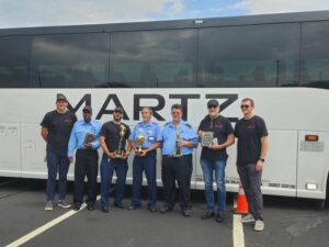 Participants and officials at Wednesday’s 2nd Annual Martz Bus Roadeo are, from left: Scott Henry, Martz CEO; Anthony Jones, Maryland; Sergio Vellez, Hazleton; Top Finisher Angelo Concert, Harveys Lake; Robert Schuhl, Maryland; Link Ogle, Florida, and John Henry, vice president, business operations. 
                                 Submitted Photo