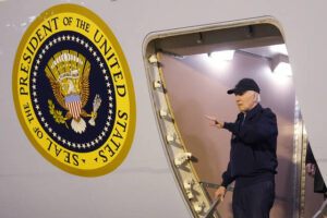 President Joe Biden waves as he walks down the steps of Air Force One at Dover Air Force Base in Delaware, Wednesday, July 17, 2024. Biden is returning to his home in Rehoboth Beach, Del., to self-isolate after testing positive for COVID-19.
                                 (AP Photo/Susan Walsh)