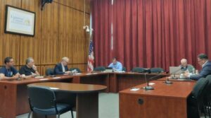 Luzerne County’s Ethics Commission discussed the need for a pressing ethics code change Monday with two council members. Seated, from left, are: county Council Chairman John Lombardo; county Administrative Services Division Head Jim Rose, the county manager’s ethics commission designee; Councilman Harry Haas; and these commission members: county District Attorney Sam Sanguedolce, county Controller Walter Griffith and citizen Ben Herring. Jay Notartomaso, the remaining citizen commission member, attended remotely.
                                 Jennifer Learn-Andes | Times Leader