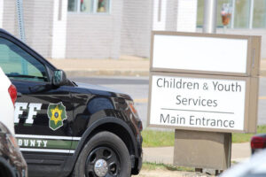A Luzerne County Sheriffs Department vehicle blocks an entrance to the parking lot of the county human services building, which houses the Children, Youth and Families agency, on Wednesday afternoon.
                                 Elizabeth Baumeister | Times Leader