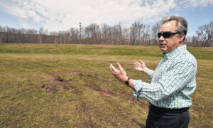 In this 2015 file photo, Luzerne County Flood Protection Authority Executive Director Christopher Belleman discusses damage all-terrain vehicle trespassers were causing on the levee system in Wyoming. Belleman is retiring in January after 12 years overseeing the agency.
File photo