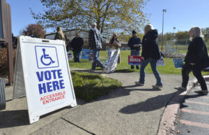 Voters arrive at the Kingston Recreation Center on Tuesday.
                                 Mark Moran | For Times Leader